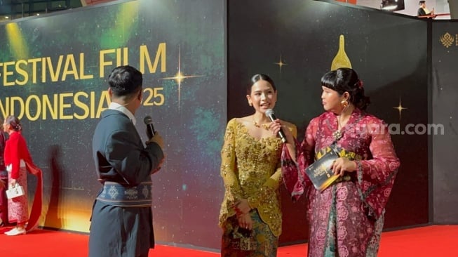 Gaun Maudy Ayunda di FFI 2025 Jadi Sorotan, Intip Detail Kupu-Kupu di Punggungnya