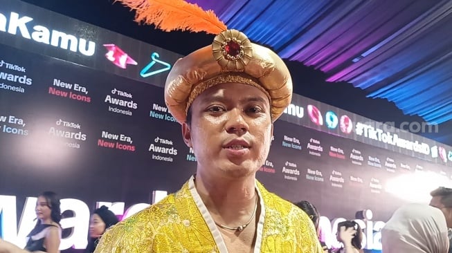 Konten kreator A Juju ditemui di Daan Mogot, Jakarta Barat pada Jumat, 21 November 2025 [Suara.com/Rena Pangesti]