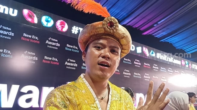 Konten kreator A Juju ditemui di Daan Mogot, Jakarta Barat pada Jumat, 21 November 2025 [Suara.com/Rena Pangesti]