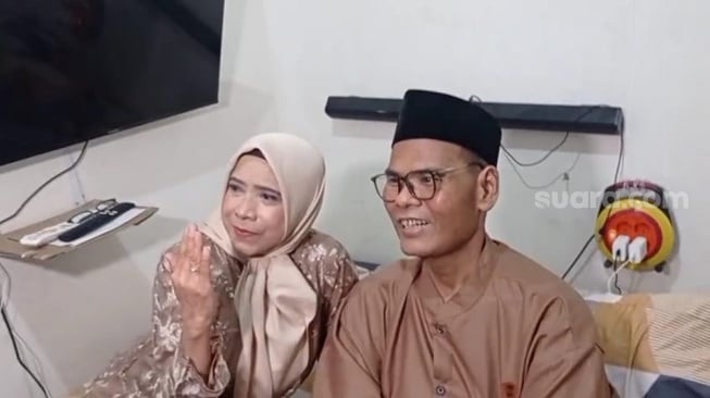 Fahmi Bo dan mantan istri, Nita Anita Khairiyyah resmi menikah lagi di kawasan Kebon Jeruk, Jakarta Barat, pada Minggu, 23 November 2025. [Suara.com/Tiara Rosana]