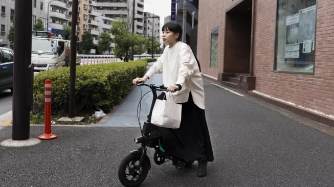 Ilustrasi sepeda listrik (Freepik/freepik)