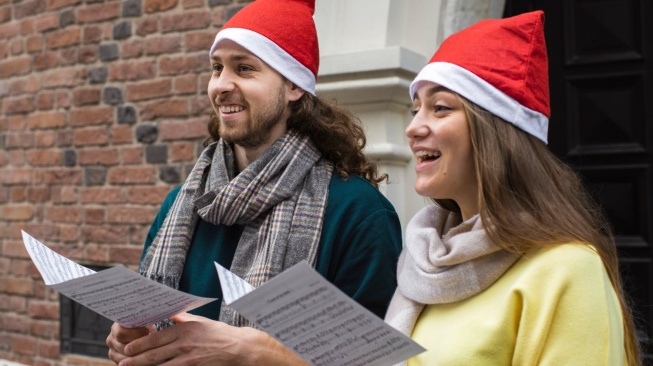 ilustrasi paduan suara Natal (freepik/freepik)
