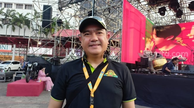 Novry Hetharia selaku Direktur Operasional Big Bang Festival di Jiexpo Kemayoran, Jakarta Pusat pada Selasa, 23 Desember 2025. [Suara.com/Rena Pangesti]