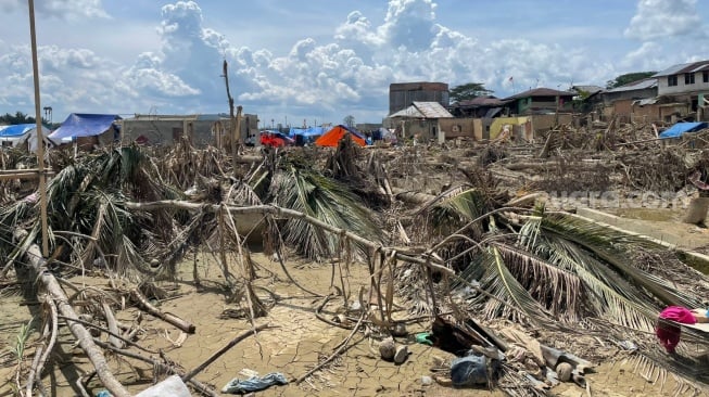 Kondisi Gampong Sukajadi, Kecamatan Karang Baru, Aceh Tamiang, setelah diterjang banjir bandang, Rabu (31/12/2025). [Suara.com/Iskandar]