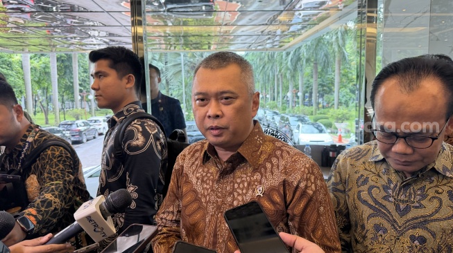 Menteri Perhubungan Dudy Purwagandhi saat ditemui di Kantor Kemenko Perekonomian, Jakarta, Kamis (5/2/2026). [Suara.com/Dicky Prastya]