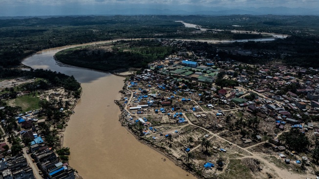Foto udara permukiman penduduk yang hancur dan rusak di Desa Sukajadi, Aceh Tamiang, Aceh, Jumat (20/2/2026). [ANTARA FOTO/Aprillio Akbar/bar]