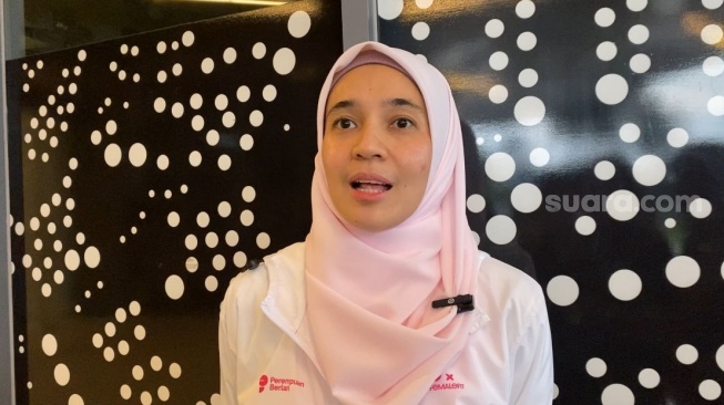 Dhini Aminarti dalam konferensi pers acara Perempuan Berlari 2026 di kawasan Bintaro, Tangerang Selatan pada Minggu, 1 Maret 2026. [Suara.com/Tiara Rosana]