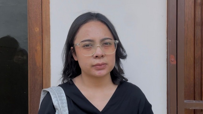 Gabriella Yosiana Jemaat Persekutuan Ouikemene Umat Kristen (POUK) Tesalonika Teluknaga Kabupaten Tangerang. [Suara.com/Wivy Hikmatulla]