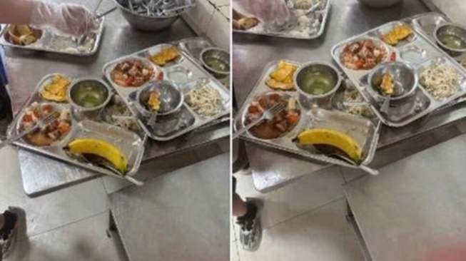 Fenomena unik terjadi di sebuah sekolah di wilayah B&igrave;nh Minh, Hanoi, Vietnam saat para orang tua meninggalkan sementara pekerjaan demi memastikan kualitas makanan anak-anak mereka. [Dan Tri]