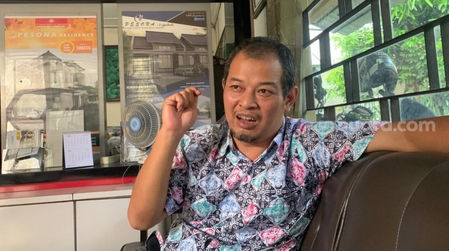 Manajer Pemasaran PT Cahyo Griya Inti Santoso (CGIS), Andri Kurniawan, saat ditemui di kantornya, Jumat (17/4/2026). (Suara.com/Irwan Febri)