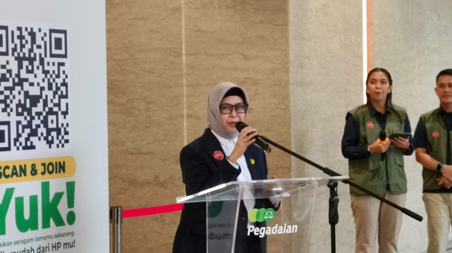 Direktur Human Capital Pegadaian Tribuana Tunggadewi dalam pidato &ldquo;PURE Movement (Pegadaian Uniform REcycle Movement)&rdquo; di The Gade Tower, Jakarta Pusat, Rabu (22/04/2026) (Suara.com/Mohammad Rhadzaki Ramadhan)