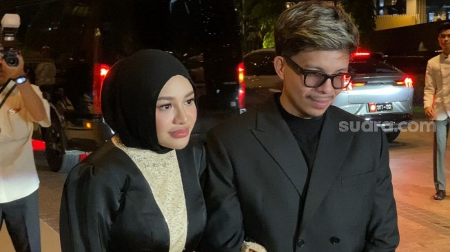 Atta Halilintar dan Aurel Hermansyah. [Tiara Rosana/Suara.com]