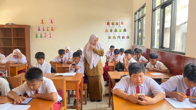 Sinergi ini dijalankan guna mempersiapkan pelaksanaan Tes Kemampuan Akademik (TKA) danAsesmen Sumatif Akhir Jenjang (ASAJ) secara lebih efektif, terukur, dan berbasis data. (Dok: Telkom)