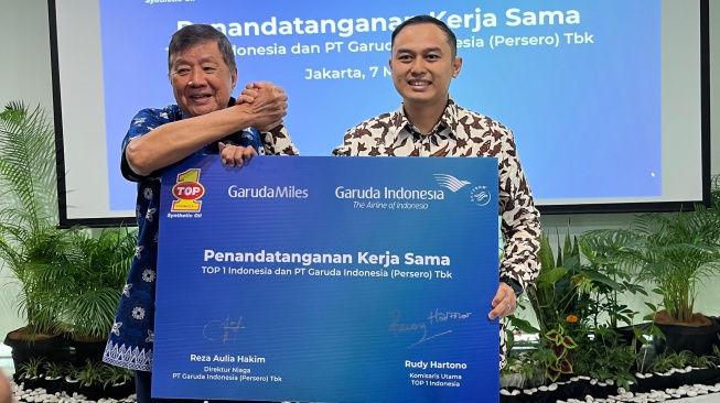 Kesepakatan kerjasama Top 1 dengan Garuda Indonesia. (Foto: SUARA.COM/Manuel Jeghesta)