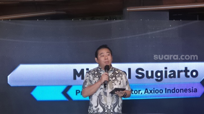 Presiden Direktur Axioo Indonesia, Michael Sugiarto saat jumpa pers di Jakarta, Kamis (21/5/2026). [Suara.com/Dythia]