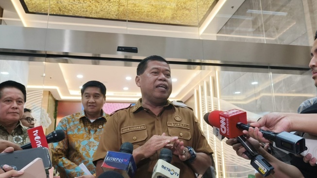 Bupati Majalengka, Eman Suherman dalam Agenda Pembahasan KUR Perumahan, Rumah Subsidi Tapak, Rumah Subsidi Rusun, dan Kota Baru Satelit yang berlangsung di Kawasan Sentra BRI, Jakarta (25/5/2026). (Suara.com/Mohammad Rhadzaki Ramadhan)