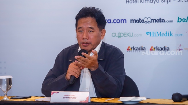 Direktur Utama Suwarjono saat menyampaikan Paparan Publik di Kimaya Hotel Jakarta, Jumat (12/6/2026). [Suara.com/Alfian Winanto]
