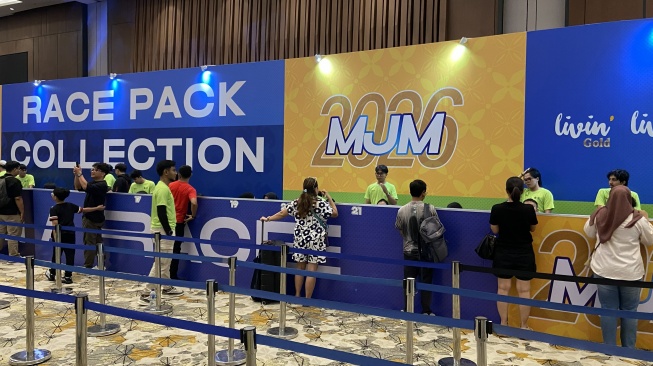 Sejumlah pelari Mandiri Jogja Marathon (MJM) 2026 mengambil race pack di Hotel Marriot Yogyakarta, Kamis (18/6/2026).
