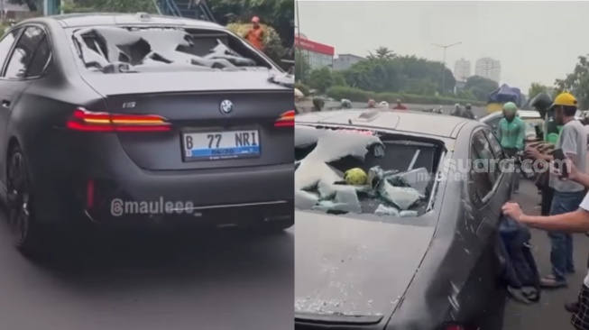 Mencekam! Detik-detik BMW Listrik Diamuk Warga di Jakbar, Nekat Tancap Gas Meski Dihadang Barrier