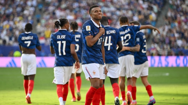 Kylian Mbappe melontarkan candaan soal AC usai membawa Prancis lolos ke 16 besar Piala Dunia 2026. Les Bleus selanjutnya akan menghadapi Paraguay. [FIFA]