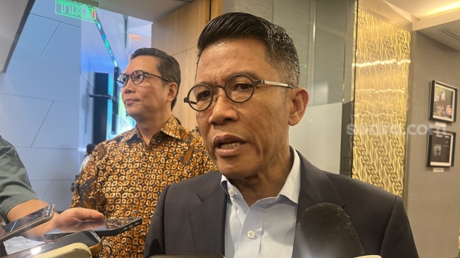 Ketua Komisi XI DPR RI, Mukhamad Misbakhun di Gedung Bank Indonesia, Jakarra, Rabu (15/7/2026). [Suara.com/Rina A]