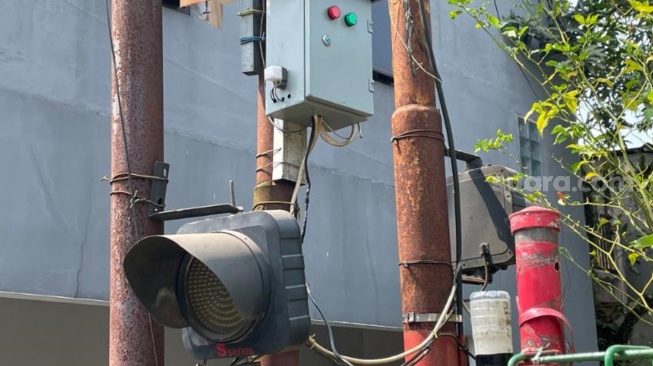 Smart Flood Warning System, alat pendeteksi banjir RT 01 dan RT 02 RW 10, Kelurahan Pondok Labu, Kecamatan Cilandak, Jakarta Selatan. (Suara.com/Adiyoga)