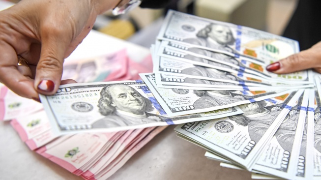 BI Batal Naikan Suku Bunga Acuan, Rupiah Melemah Lagi