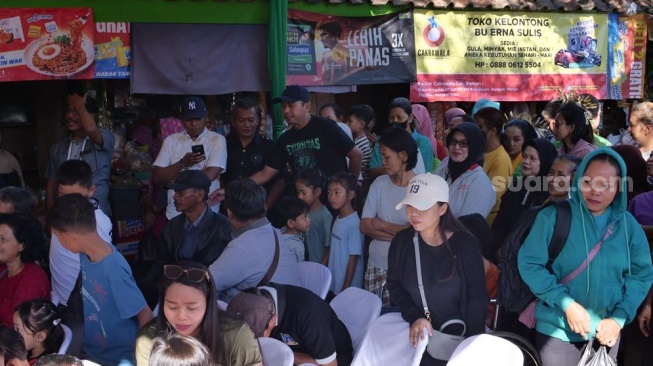 Gerakan Meramaikan Pasar Rakyat (GEMPAR) di Pasar Kebonagung, Kalurahan Sendangagung, Kapanewon Minggir, pada Sabtu (25/7/2026). (Suarajogja.id/Praba Mustika)
