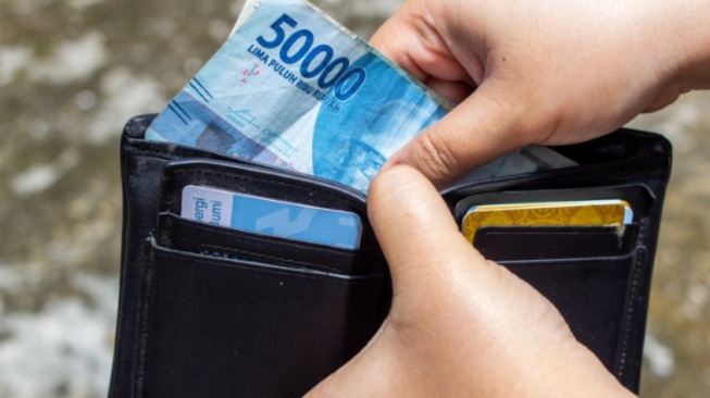 Bukan Sekadar Angka di Layar: Menagih Kedaulatan Rupiah dan Jurus BI Lepas dari Kecanduan Dolar