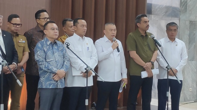Pemerintah memperluas cakupan Peraturan Presiden (Perpres) tentang Transportasi Online atau Perpres Ojol. [Suara.com/Bagaskara]