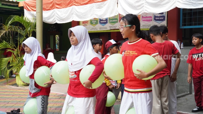 Ilustrasi pelajar mengikuti lomba Agustusan [Suara.com/Ist-Lemonilo]