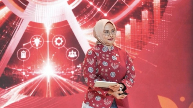 Direktur Utama Telkom Dian Siswarini menyampaikan paparan dalam rangkaian Bali Annual Telkom International Conference (BATIC) 2026 di Bali. (Dok: Telkom)