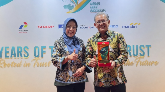 Telkom Solution meraih penghargaan kategori “Business Impact & Industry Growth” dari Kabar Group Indonesia (KGI). (Dok: Telkom)