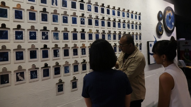 Karya Nina Nanoka yang dipamerkan dikuratori fotografer Michael Steve. (Dok: PORTA by Ambarrukmo)