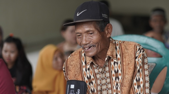 Warga Kubu Raya saat mendapatkan pelayanan pemeriksaan kesehatan gratis. [Ist]