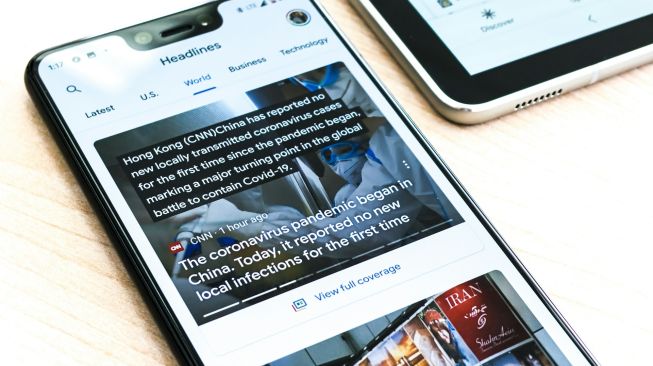 Ilustrasi berita online. [Unsplash]