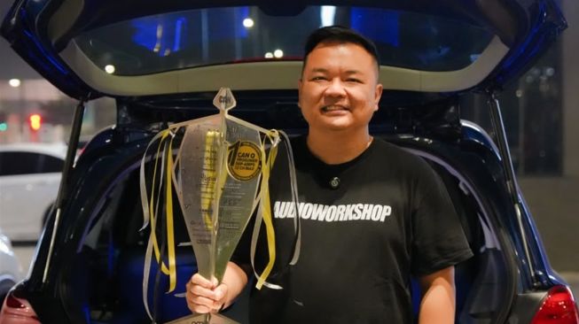 Honda Odyssey racikan Andy Setiawan dari Yogyakarta meraih gelar Asia Champion 2026 kategori DSP Amplifier 12 Channel setelah mengungguli pesaing dari sembilan negara. [Dok. Istimewa]
