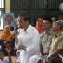Jokowi Cium Siswa "Down Syndrom" dan Lumpuh di SMPN 223 Jakarta 