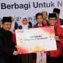 Telkomsel Melayani dan Berbagi dengan 9.000 Anak Yatim