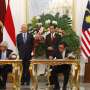 OJK Teken Kerjasama dengan Bank Negara Malaysia