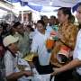 Jokowi Saksikan Penyerahan Paket Bahan Pokok di Jakarta Utara