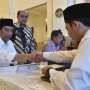 Jokowi-JK Bayar Zakat