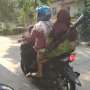 Jadi Raja Jalanan, Ibu Ini Naik Motor Sambil Bawa Senapan