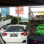 Viral! Rebutan Masuk Tol dengan Truk, Mobilio Lecet Parah