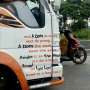 Siapa yang Paham Arti Tulisan Inggris di Pintu Truk Ini?