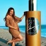 Wow, Chrissy Teigen Rilis Body Oil yang Bikin Badan Kinclong!