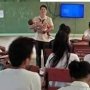 Tuai Pujian, Guru Ini Gendong Bayi Siswinya yang Ikuti Ujian