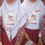 Viral Foto Stiker Kampanye Jokowi-Ma'ruf Ditempel di Seragam Anak SD
