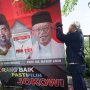 Hari Pertama Masa Tenang Pemilu, Ganjar Copot APK  Baliho Jokowi-Ma'ruf