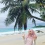Di Bawah Nyiur Hijau, Menikmati Pesona Pantai Pasir Tinggi di Simeulue